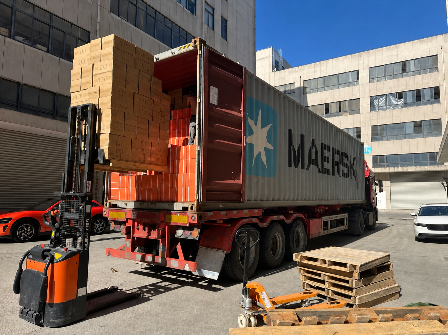 Adhesive products being loaded for export delivery